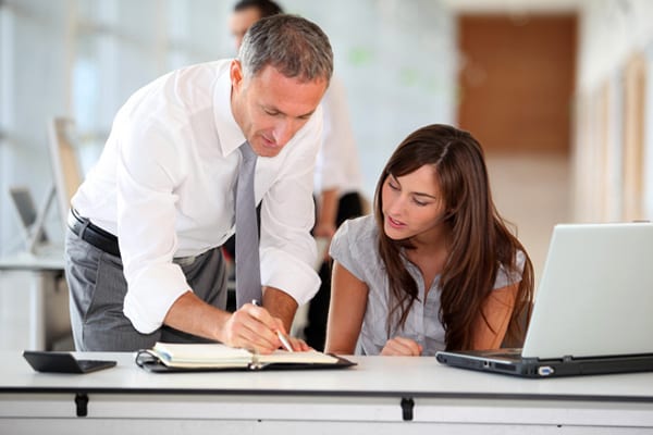 Manager-and-secretary-working-in-the-office